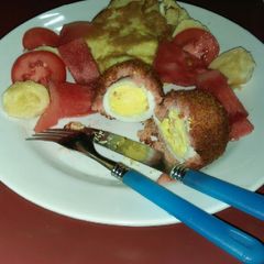 A picture of Sausage coated eggs.