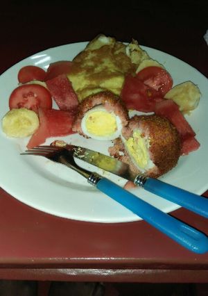 A picture of Sausage coated eggs.