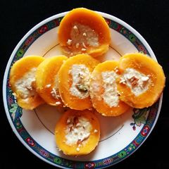 A picture of Stuffed mango kulfi.