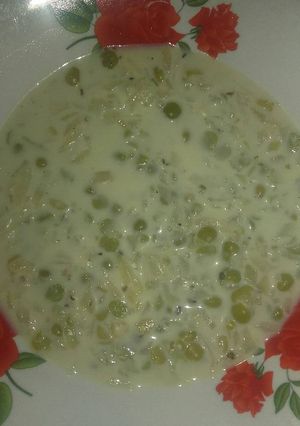 Una foto de Arvejas con queso y leche