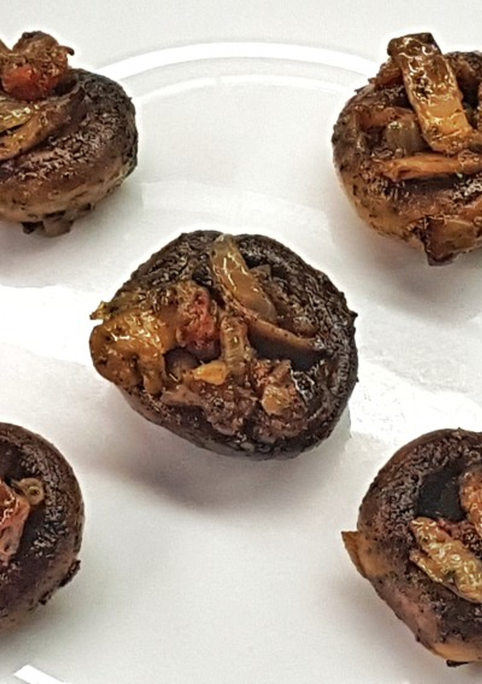 Una foto de Funghi al pesto ripieni