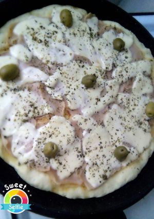 Una foto de Pizza casera deliciosa 🍕