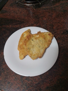 Una foto de Merluza empanada