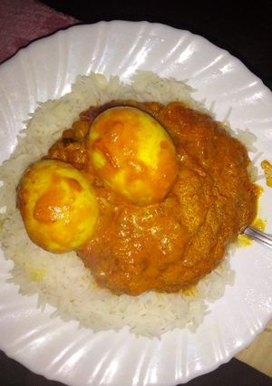 A picture of Rice and egg curry.