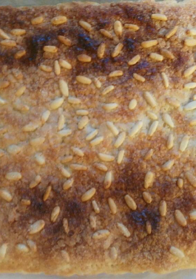 Una foto de Coca de chicharrones