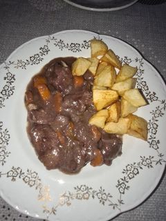 Una foto de Carrillada al vino tinto