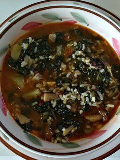 Una foto de Arroz con acelgas y setas