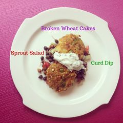 A picture of Sprout Salad, Broken wheat cakes and yogurt dip.