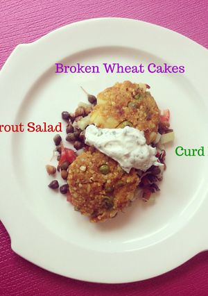 A picture of Sprout Salad, Broken wheat cakes and yogurt dip.