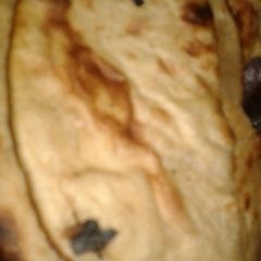 A picture of Naan oven baked.