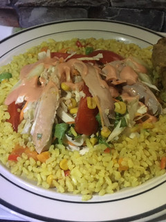 A picture of Fried rice and chicken salad.