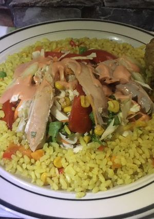 A picture of Fried rice and chicken salad.
