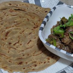 A picture of Khasta bal wala chaki ke atty Ka paratha.