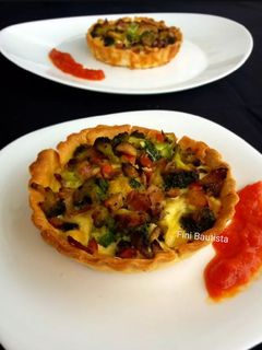 Una foto de Quiches individuales de brócoli y champiñones