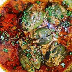 A picture of Stuffed egg plant (brinjal).