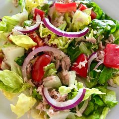 A picture of Tuna salad with orange dressing.