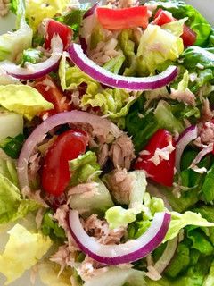A picture of Tuna salad with orange dressing.