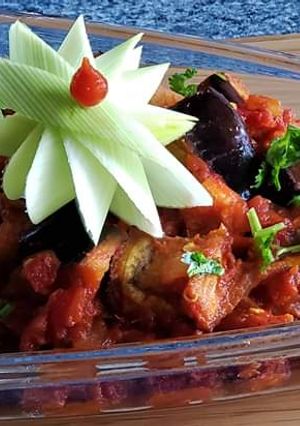 A picture of Baked Brinjals and Papers.