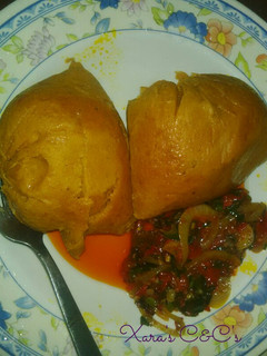A picture of Moi-moi with pepper and spring onion sauce.