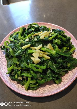 A picture of Stir Fry Pea Brussel or Tau Miu.