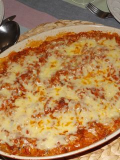 Una foto de Pastel de carne de pollo, champiñones y verduras