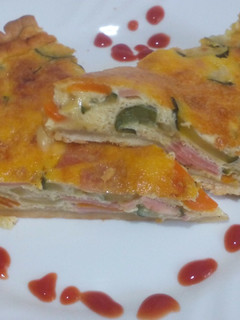 Una foto de Quiche de calabacín y zanahoria