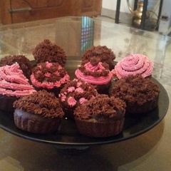 A picture of Chocolate cupcakes with Icing.