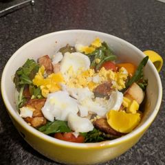 A picture of Chicken rocket salad with sweet chilli dressing.