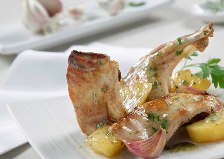 Conejo al ajillo con patatas