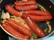 Una foto de chorizo con pimientos