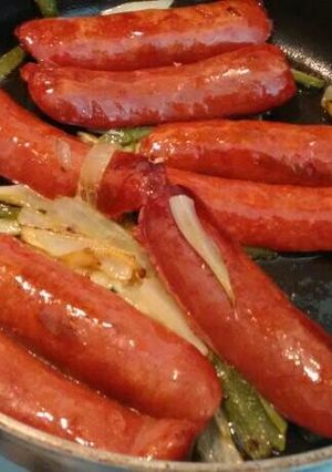 Una foto de Chorizos fritos con pimientos y cebollín