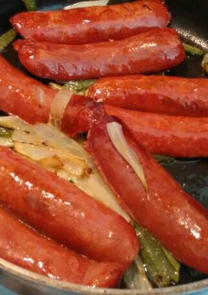 Una foto de Chorizos fritos con pimientos y cebollín