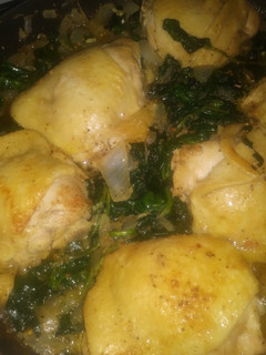 A picture of Lady A's Smoothered Chicken & Spinach And Butter Sauce 😋.