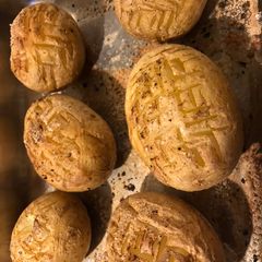A picture of Baked Potatoes with Garlic Salt, Black Pepper and Sea Salt.