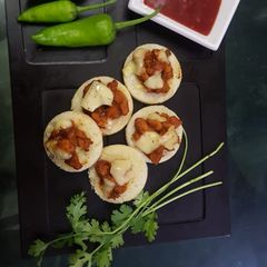 A picture of Mini cheesy dics.