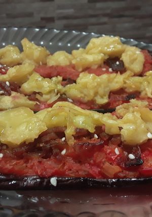 Una foto de Berenjenas a la pizza...🤨🙄🤔🍕🍆🍅🧀🥓🍕