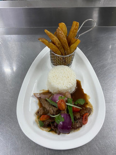 Una foto de Lomo saltado 🇵🇪