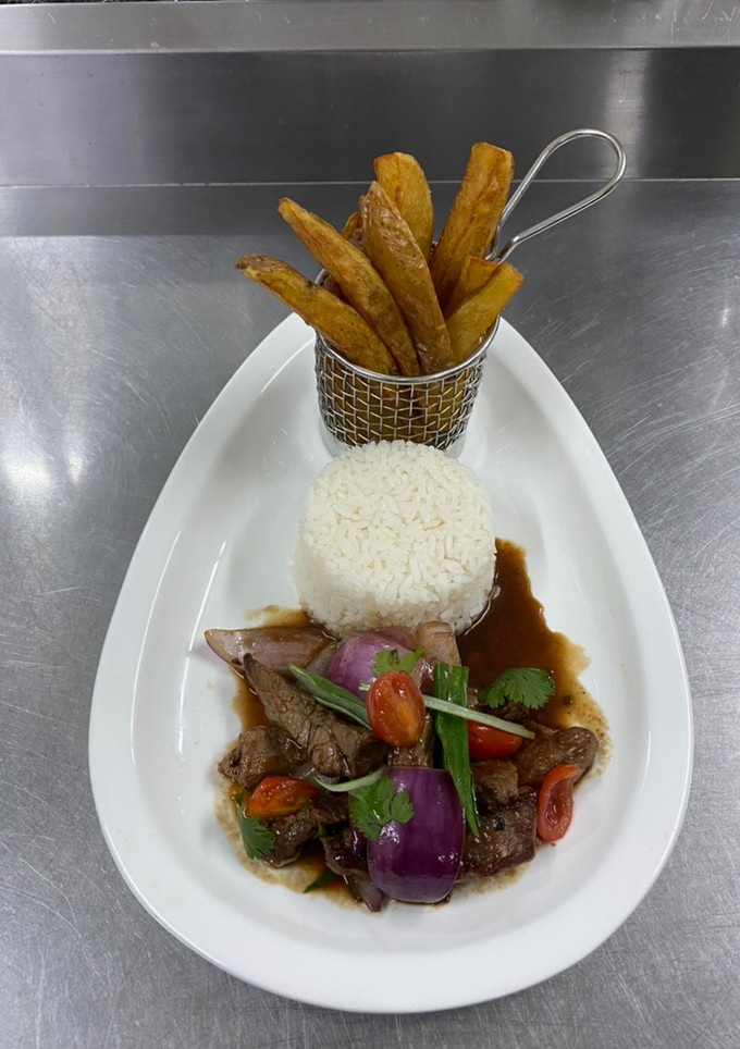Una foto de Lomo saltado 🇵🇪