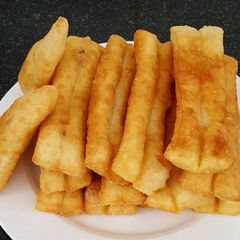 A picture of Fried dough stick with natural yeast 油条.