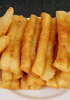 A picture of Fried dough stick with natural yeast 油条.