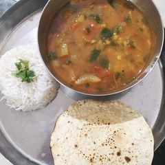 A picture of Sambhar rice.