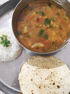 A picture of Sambhar rice.