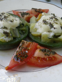 Una foto de Zapallitos rellenos con vegetales