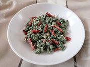 Una foto di spatzle con pancetta