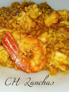 Una foto de Arroz de langostinos