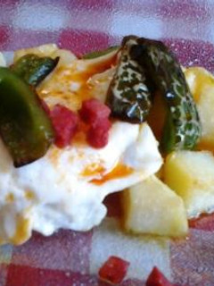 Una foto de Huevos rotos
