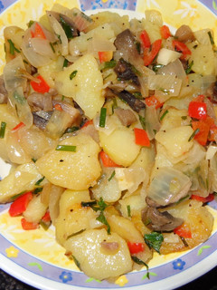 Una foto de Papas guisadas con champiñones