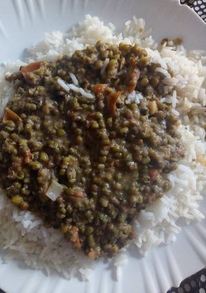 A picture of Rice and greengrams stew.