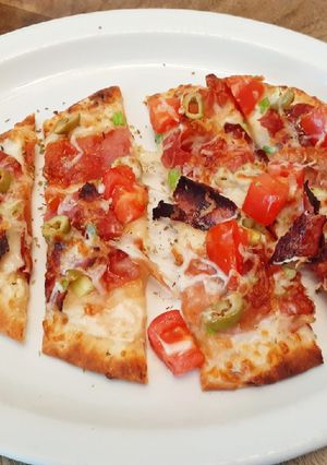 A picture of Prosciutto Naan Pizza.