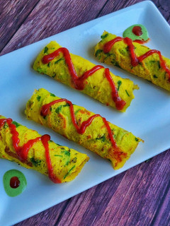 A picture of Stuffed moong dal chilla rolls.